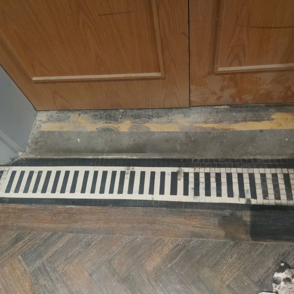 Threshold tile restoration — after