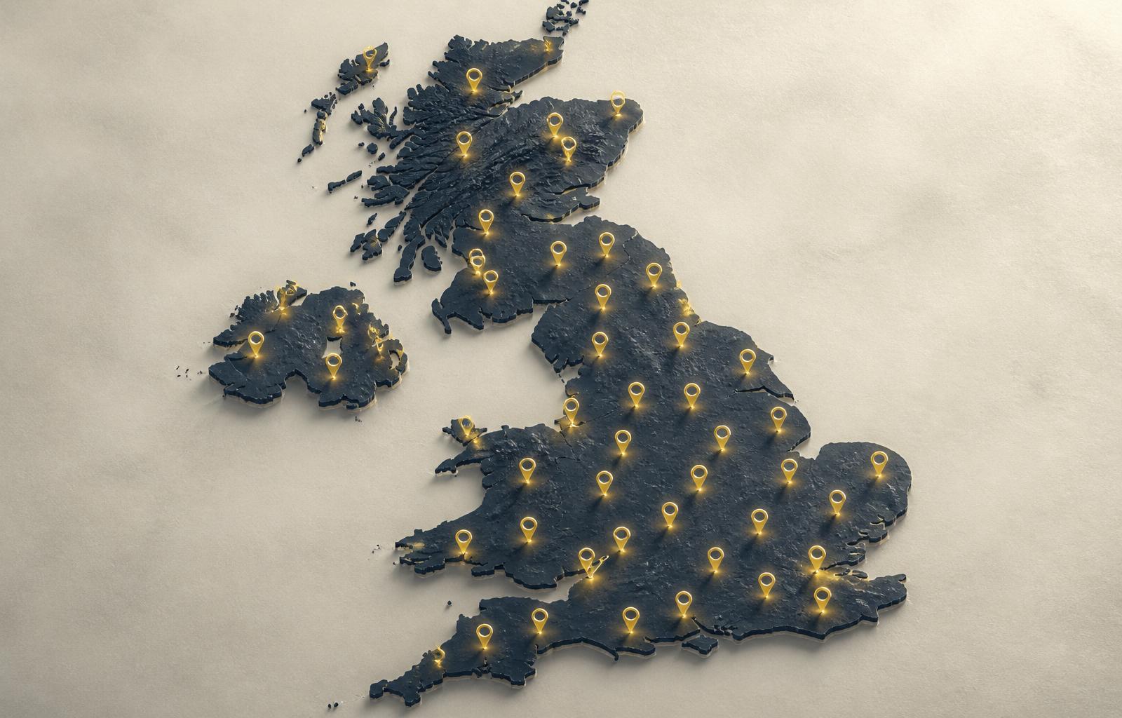 Stylised map of the United Kingdom in slate navy with glowing yellow location pins scattered across England, Scotland, Wales and Northern Ireland — nationwide surface repair coverage.
